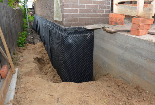 SJ Waterproofing Pros technician performing targeted Waterproofing assessment in Richmond, KY